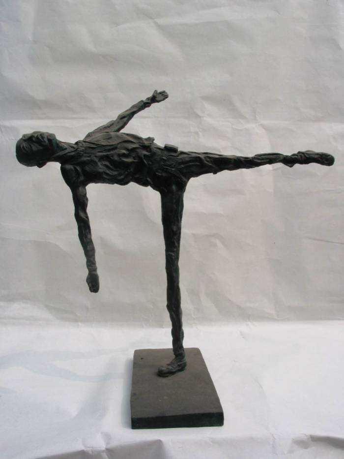 Balancing - a contemporary sculpture of a man balancing one leg by contemporary Chinese sculptor Shen Xiaonan