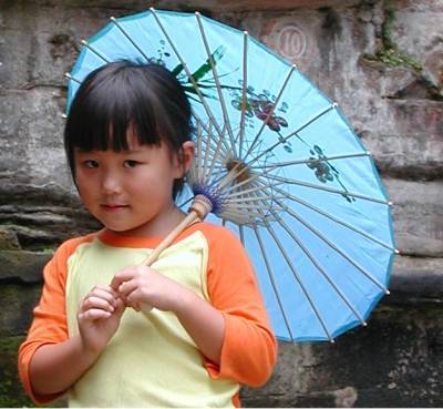 Yezi at Dazu with her blue parasol