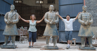 Shen Xioanan and fellow sculptor Laury Dizengremel with their first 3 Terracotta Warriors of Tennis sculptures